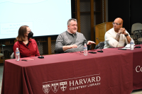 A. David Lewis speaking at the opening panel.