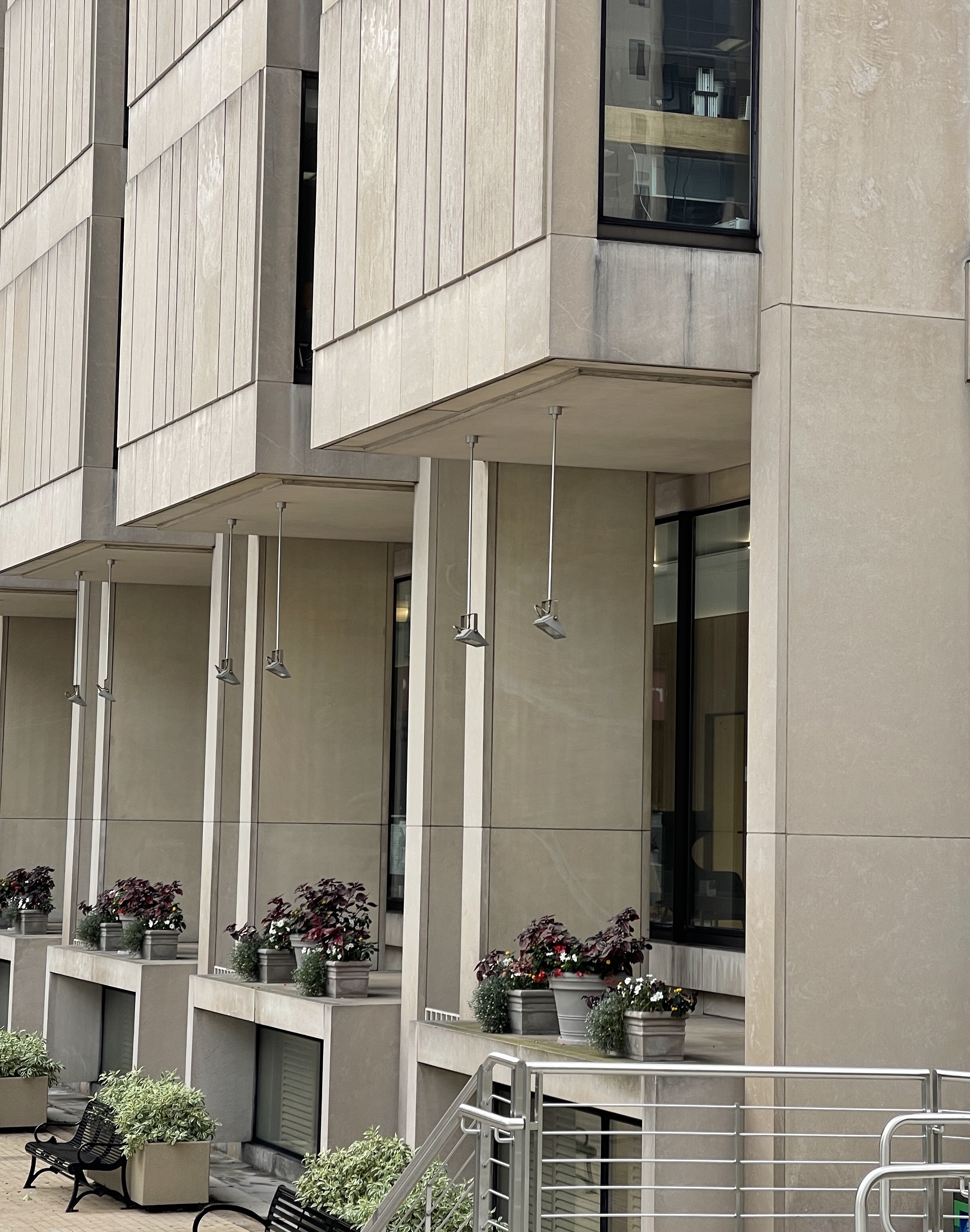 flower pots and benches outside of Countway Library